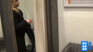 Big-Titted Blonde Fingers Herself in a Public Changing Room