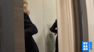 Big-Titted Blonde Fingers Herself in a Public Changing Room