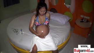 Amateur pregnant Thai slut masturbating