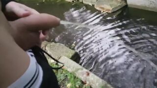 Pissing Outdoors with a Big Cock Twink