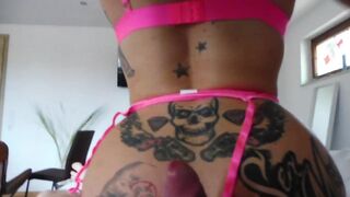 Tattooed babe with a big ass gives a blowjob and rides cock in POV video.