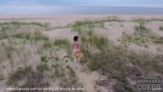 hot bikini babe masturbating on beach