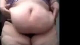 Purple-Dressed SSBBW Shows Off and Plays with Her Giant Belly