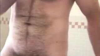 Hairy Bear Strokes His Cock in the Tub