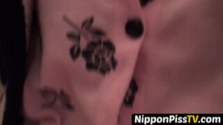 Japanese dollface tops a cup off with her pee and records it