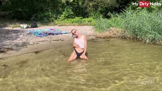 Sexy amateur Schnuggie91 sucks cock outdoors and gets cum in mouth