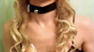 Sissy in Bunny Ears Plays with Black Dildo