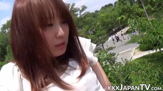 Japanese redhead teen pussy fingered in a city park