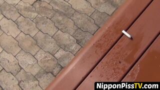 NipponPissTV.com - Debauched Asian schoolgirl pissing hard in public view on streets