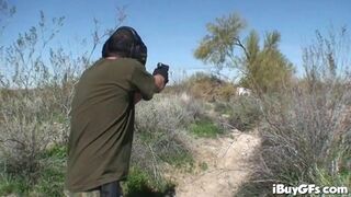 Whitney Stevens armed and outdoors