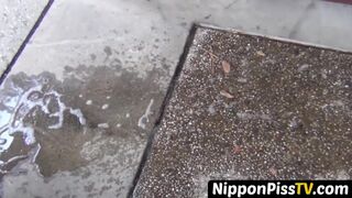 NipponPissTV.com - Real Japanese lady filmed while peeing in closeup outdoors