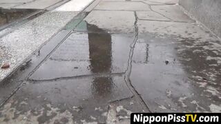 NipponPissTV.com - Real Japanese lady filmed while peeing in closeup outdoors