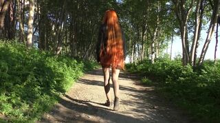 Summer walk in a mini skirt without panties