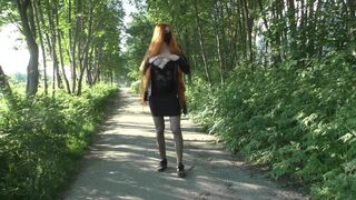 Summer walk in a mini skirt without panties