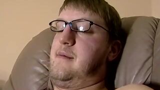 JoeSchmoeXXX.com - Cute amateur Jack with glasses jerks off on a leather sofa