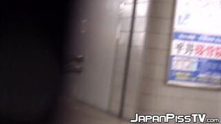 Japanese girls peeing in public toilet while voyeur watches