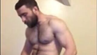 Hairy British Hunk Jacks Off