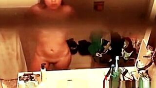 Small breasted Asian Stepmom spied in bathroom