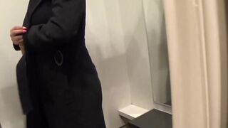 Big-Titted Blonde Fingers Herself in a Public Changing Room