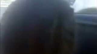 Pierced Brunette Blows in the Car