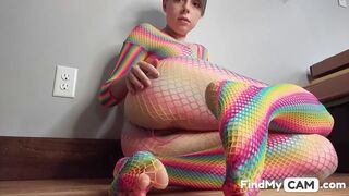 Teen in Rainbow Fishnets Fingers Herself