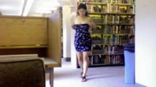 Hairy Nerd Strips on Webcam in Library