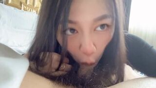 Asian Amateur Babe Gives a Knee-high Footjob