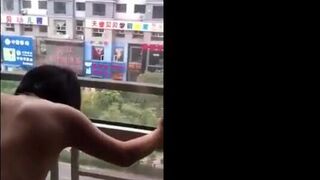 Asian Girl Shared at Open Window