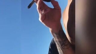 Smoking Latina with Big Tits at an Italian Beach