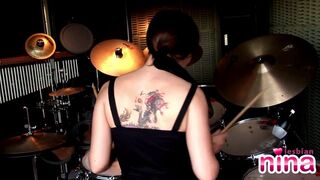 Lesbian Nina with drums showing her perfect body