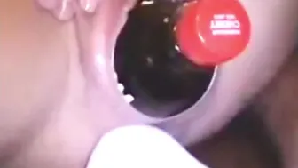 My large cunt filled with a big bottle