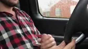 Stroking my big cock while driving