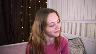 Smiling Girl in Bedroom Tease