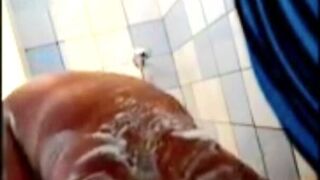 Stepmom soaping her lush mature body