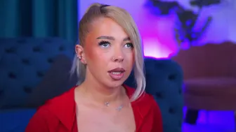 Tattooed Blonde Teases with Dildo in Red Lingerie