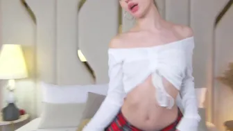 Blonde Teases in White Top & Plaid Skirt