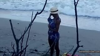 My stepdaughter teases me on the beach