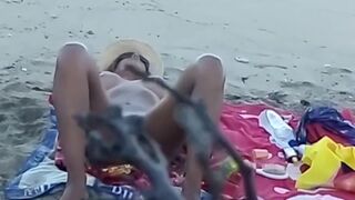 My stepdaughter teases me on the beach