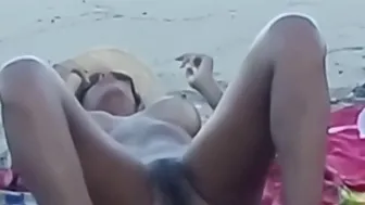 My stepdaughter teases me on the beach