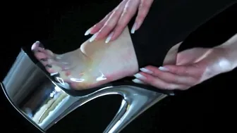 Feet licking slave with sexy leather dominatrix