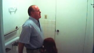 Bathroom slut sucks dick in restroom
