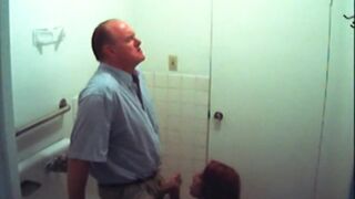 Bathroom slut sucks dick in restroom