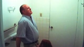 Bathroom slut sucks dick in restroom