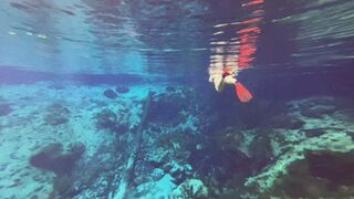 Carissa in a smaller spring freediving and bonus play in the red dress underwater