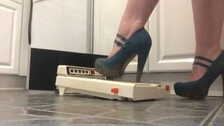 Clips 4 Sale - Teal strappy heels with metal tip destroy historic pin ball game