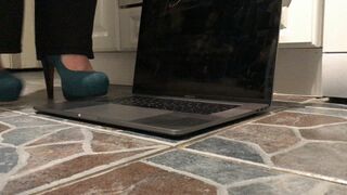 Cigarette and muffin crush on mac book pro with heels