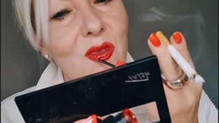 Clips 4 Sale - Stepmummy makes up her lips with glossy red lipstick while smoking a cork*OMI's*French Inhale*Close up sequences*cheek cavities pull