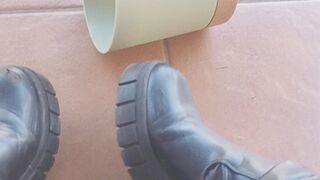black boots and crushing vase roll
