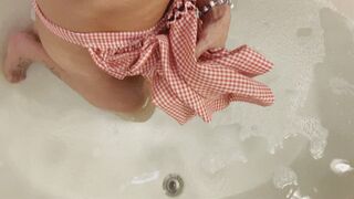 Clips 4 Sale - Carissa in the vintage apron and bra in the bath with bare feet