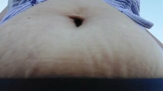 pretty in purple under Latina milf Giantess Bouncy bloated Belly Bouncy as she walks while occasionally fingering her BellyButton in a crop top